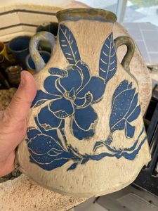 hanging pottery with floral design