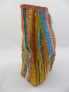 Tall, multi-color woven basket
